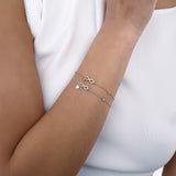 Bracciale Elegante con Simbolo dell'Infinito e Zirconi Pavé in Oro 14K